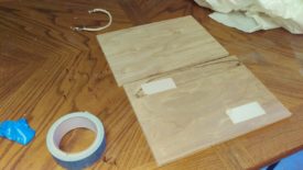 Double-stick tape the panels together