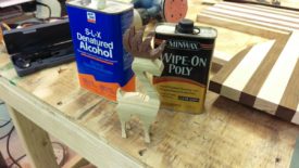 Wiping off dust and finishing with polyurethane
