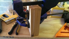 I glued together an oversized stack of wood, then cut it down