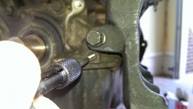 Tapping appropriate hole for sensor mount
