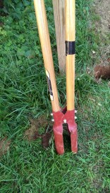 Using the post-hole digger with 2' marked with tape