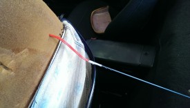 Feeding wire to the back of the seat