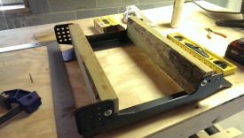 Cutting guides in the shop (2x4), attaching with screw and washer