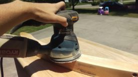 Let the weight of the sander do the work