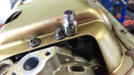 It uses these star bolts, which you can remove with an 8mm 12-point socket