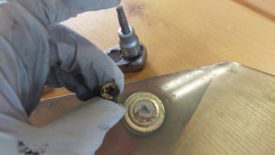 Remove bolt with T-30 bit