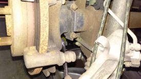 Lower brake pad bracket bolt
