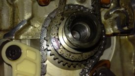 Dot on the timing gear, very hard to see, but right under the dark link